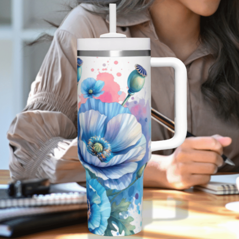 a woman sitting at a desk with a coffee mug