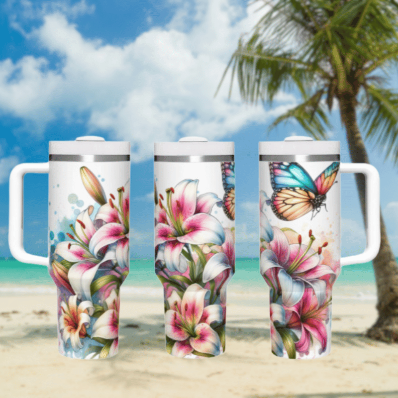 three travel mugs on a beach with a palm tree in the background