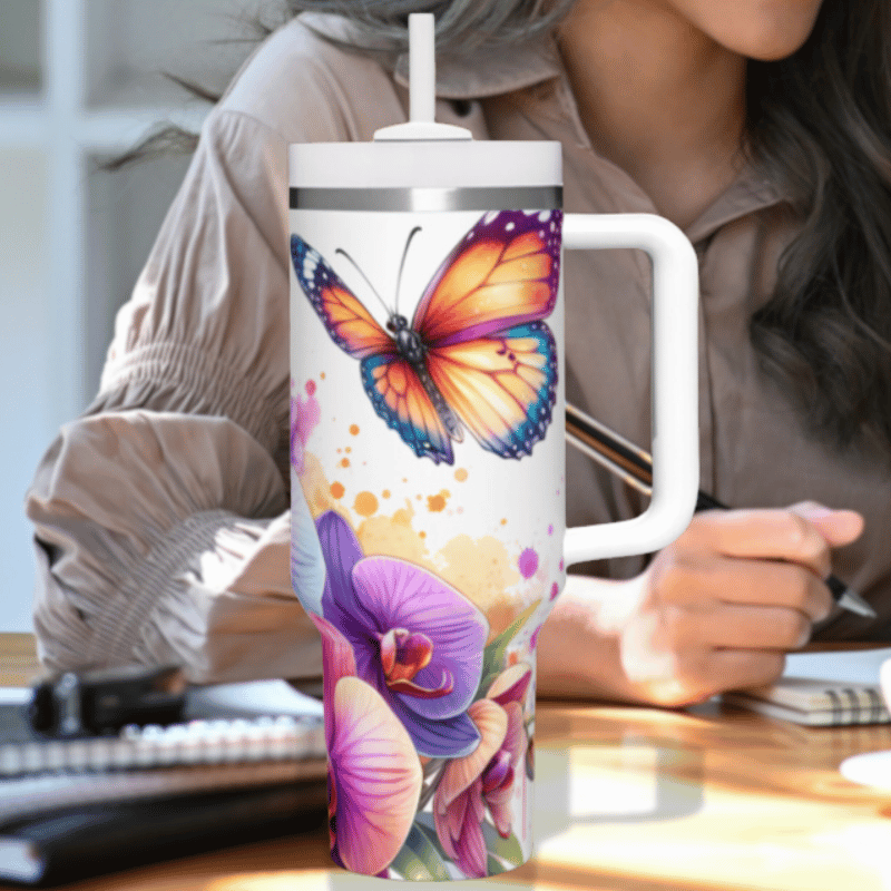 a woman sitting at a desk with a coffee mug