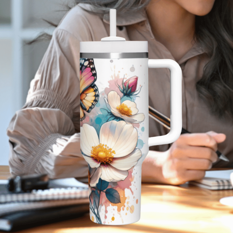 a woman sitting at a desk with a coffee mug