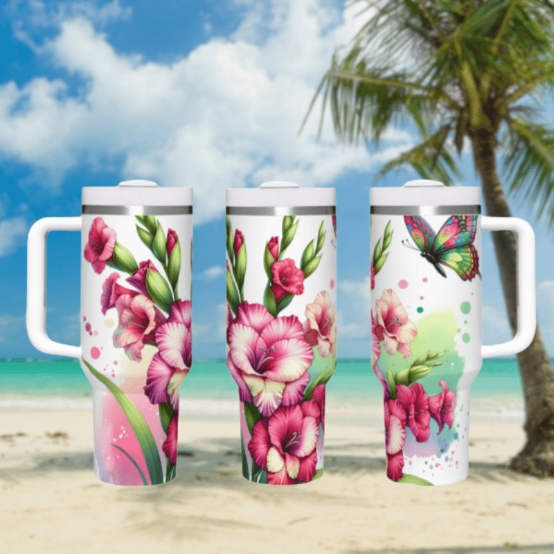 three travel mugs on a beach with a palm tree in the background