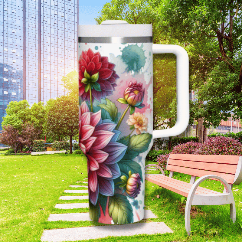 a painted coffee mug sitting next to a park bench