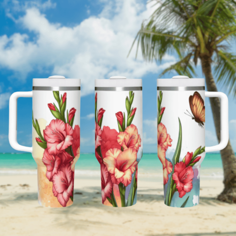 three travel mugs on a beach with a palm tree in the background