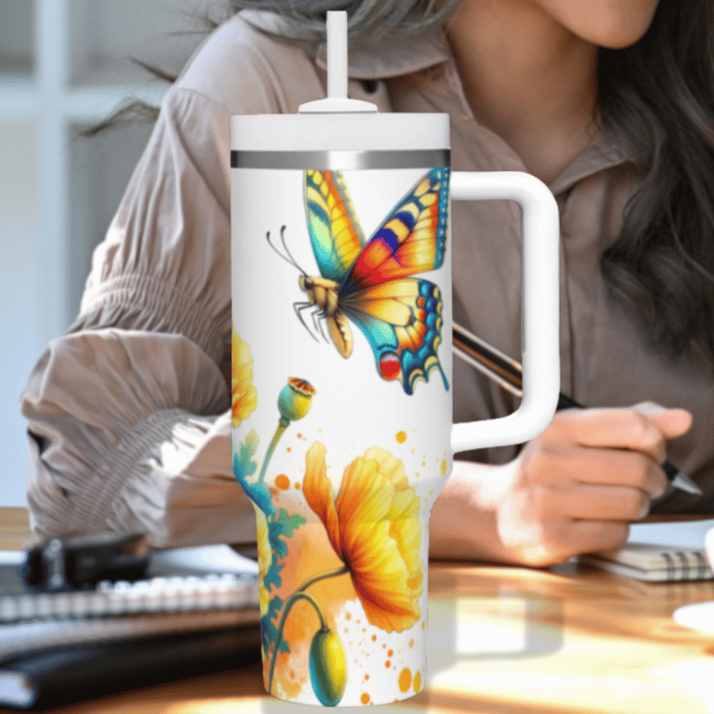 a woman sitting at a desk with a coffee mug