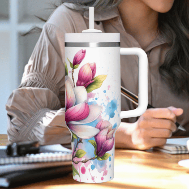 a woman sitting at a desk with a coffee mug