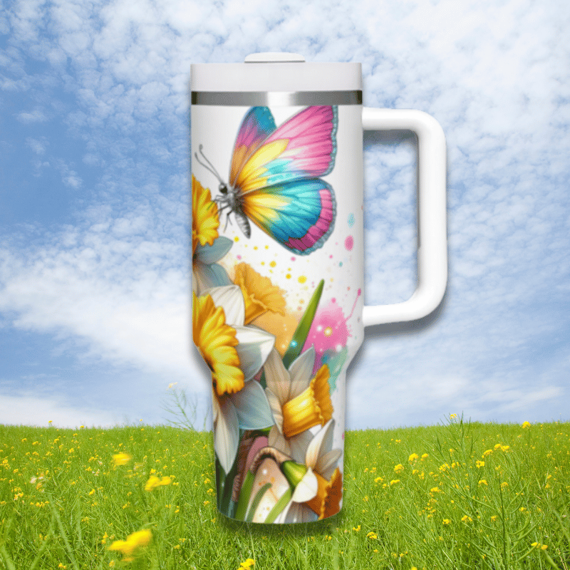 a picture of a butterfly on a travel mug