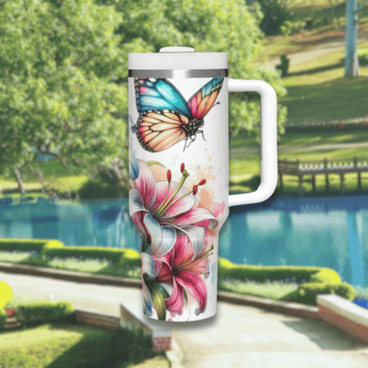 a white coffee mug with a colorful butterfly on it