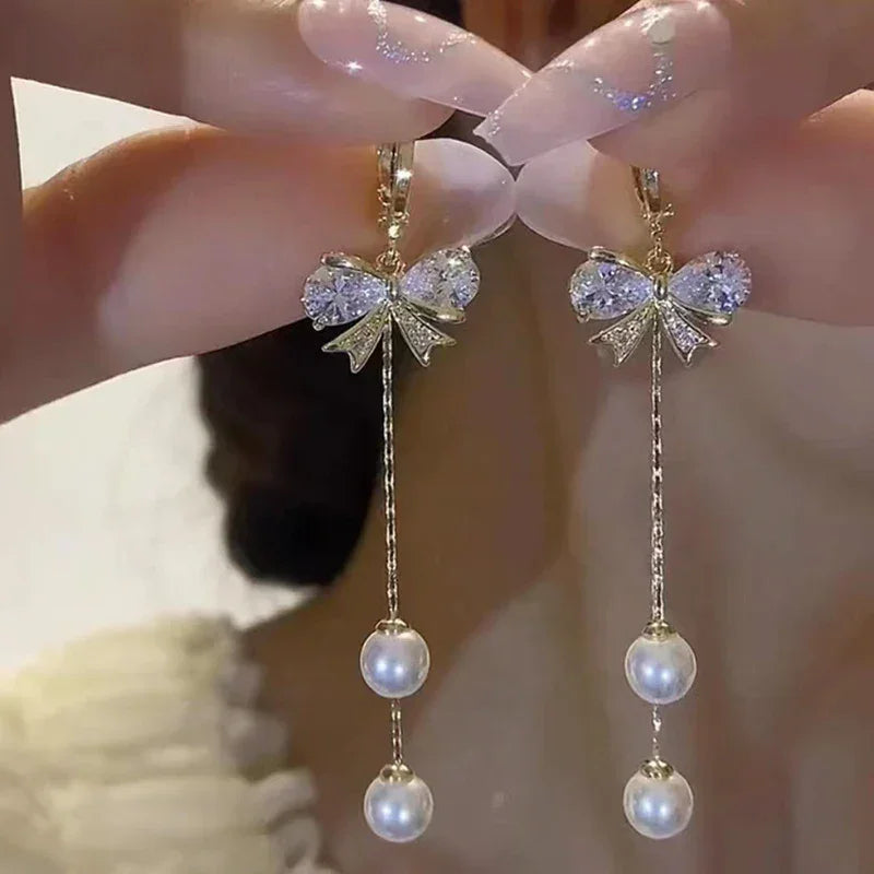 Rhinestone Bow Pendant Earrings With Pearl Tassel Gold Tone