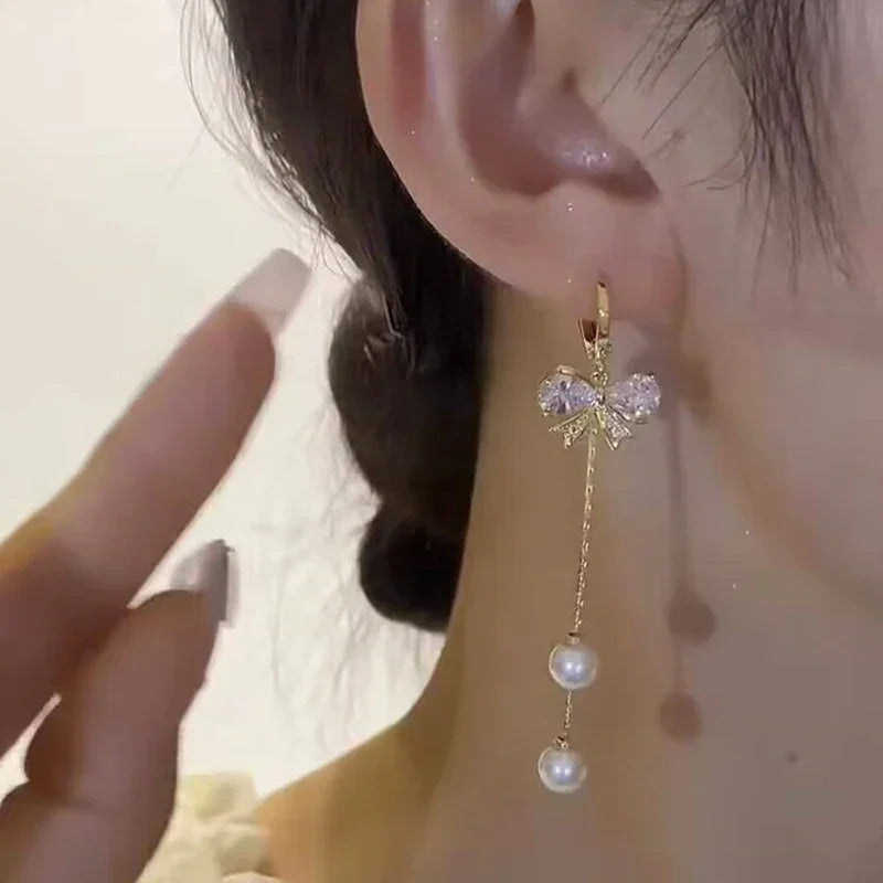 Rhinestone Bow Pendant Earrings With Pearl Tassel Gold Tone