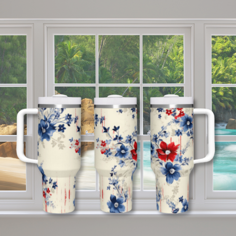 a set of three white and blue floral mugs sitting on a window sill