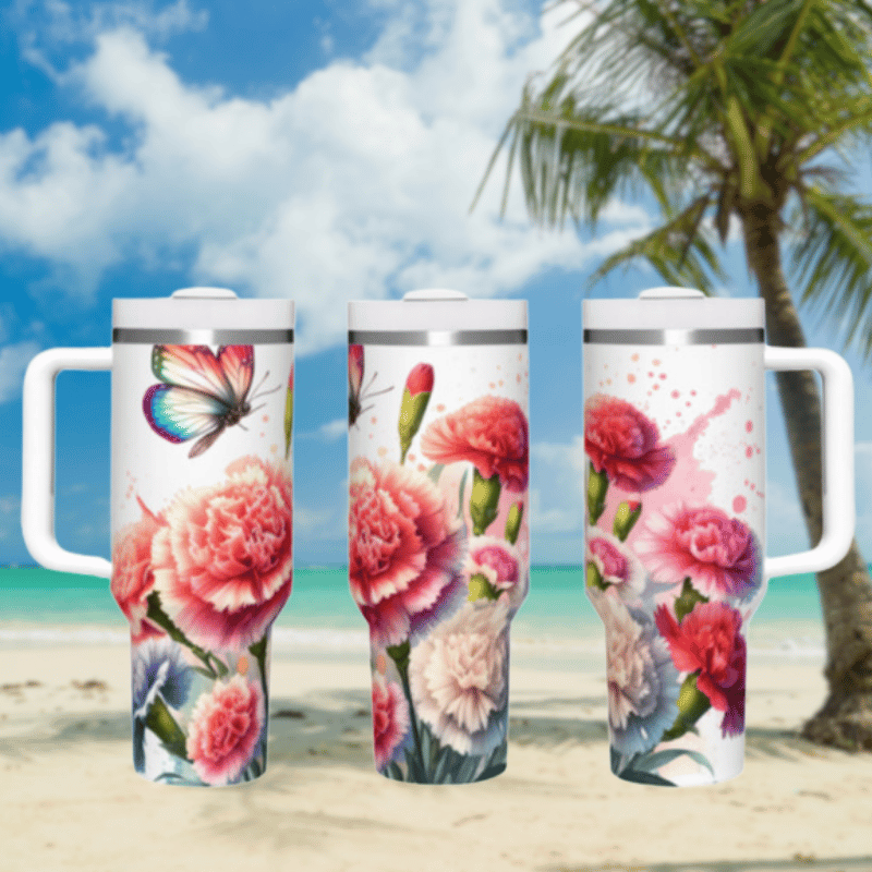 three travel mugs on a beach with a palm tree in the background