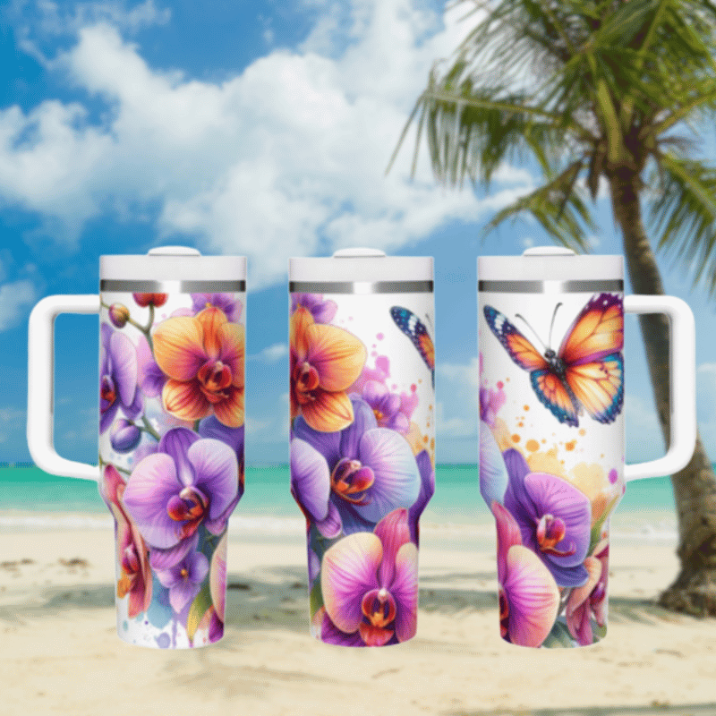 three travel mugs on a beach with a palm tree in the background