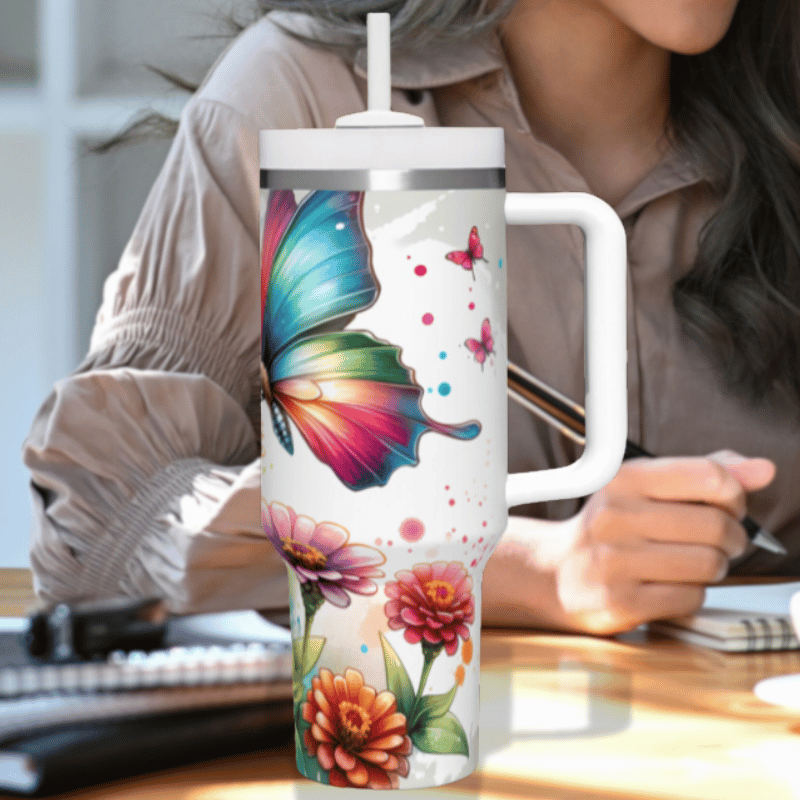 a woman sitting at a desk with a coffee mug