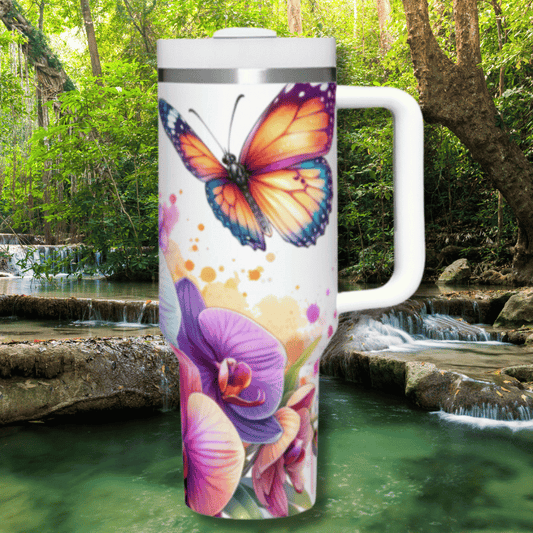 a white coffee mug with a butterfly painted on it