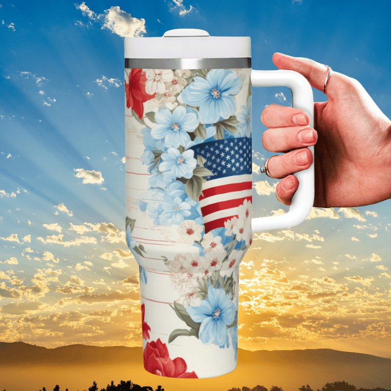 a person holding a coffee cup with a flag on it