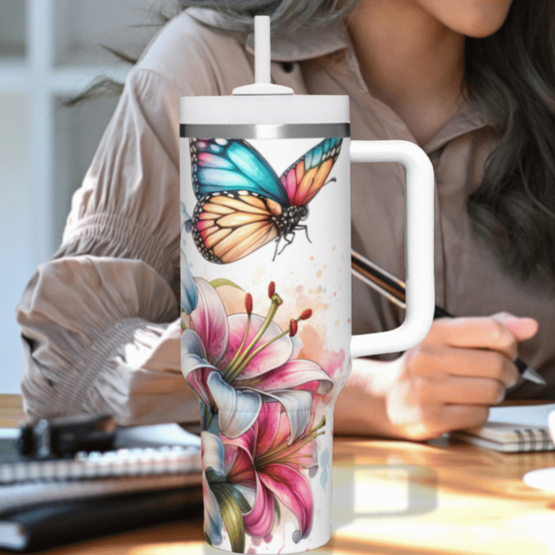 a woman sitting at a desk with a coffee mug